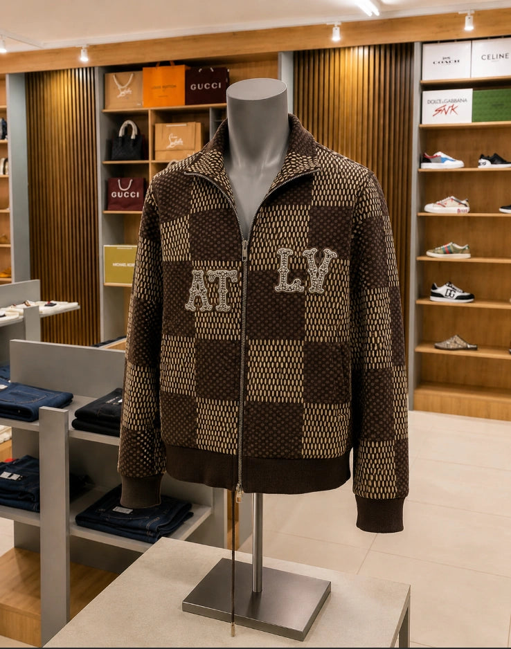 Louis Vuitton Damier Knit Zip-Up Blouson from Pharrell Williams' debut collections.