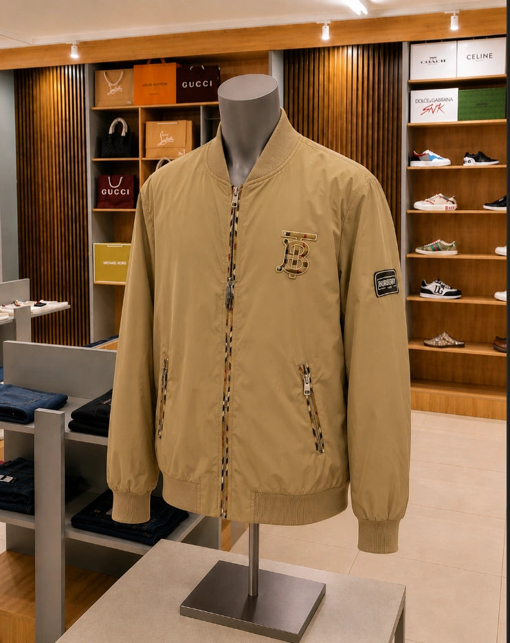 Burberry Monogram Motif Bomber Jacket in their signature honey/beige tone.