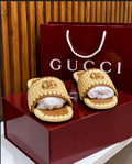 Gucci Raffia Double G Slide Sandals.