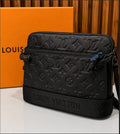Louis Vuitton Trio Messenger Bag in Monogram Shadow leather.