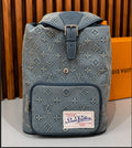 Louis Vuitton Montsouris Backpack in Monogram Washed Denim.
