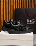 Dolce & Gabbana New Roma Rhinestone-Embellished Leather Sneakers in the Triple Black colorway.