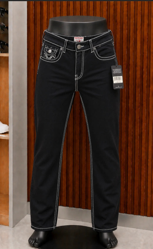 True Religion Ricky Straight Jeans featuring a monochromatic black wash with sharp contrast stitch detailing.
