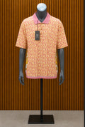 Custom peach and pink Versace Allover Logo Polo.