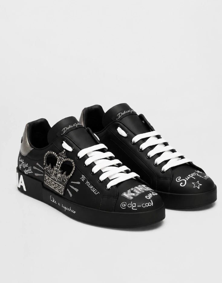 Dolce & Gabbana Portofino Crown Patch Leather Sneakers in the black and silver print colorway.