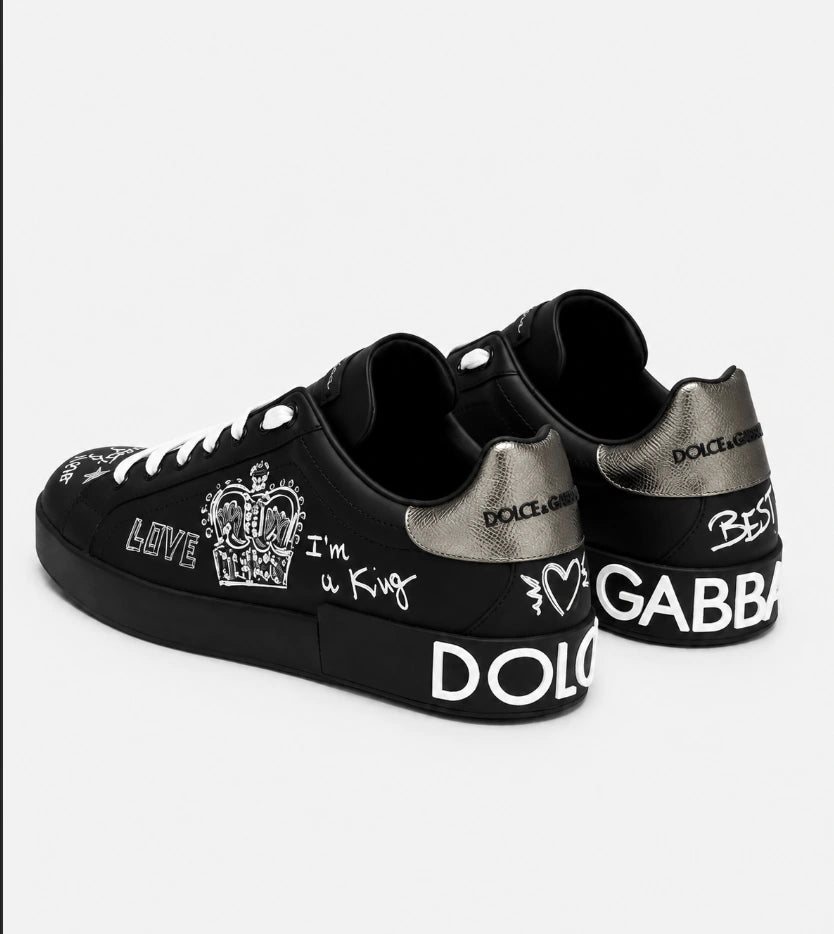 Dolce & Gabbana Portofino Crown Patch Leather Sneakers in the black and silver print colorway.