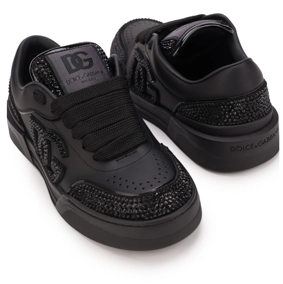 Dolce & Gabbana New Roma Rhinestone-Embellished Leather Sneakers in the Triple Black colorway.