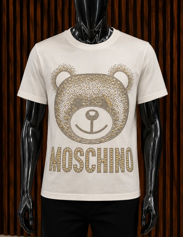 Moschino Studded Teddy Bear Cotton T-Shirt in an off-white/cream colorway.